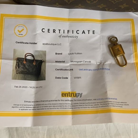 Authenticated Louis Vuitton Monogram Canvas with COA and lock and key #317 - Picture 8 of 16